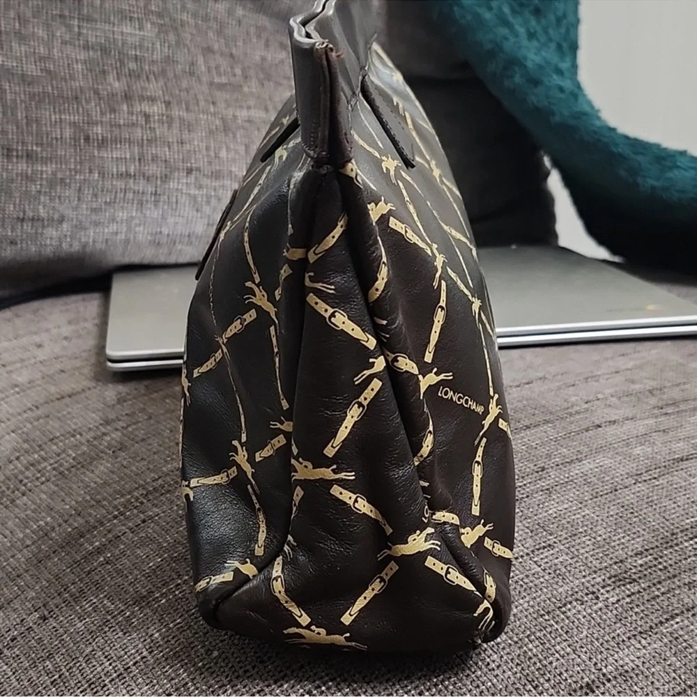 Longchamp clutch repeating
